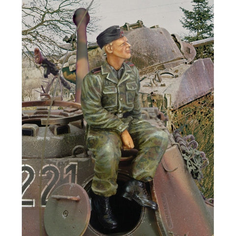 Waffen SS Tanker sitting on turret