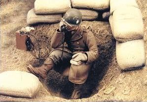 G I with fieldphone Normandy 1944