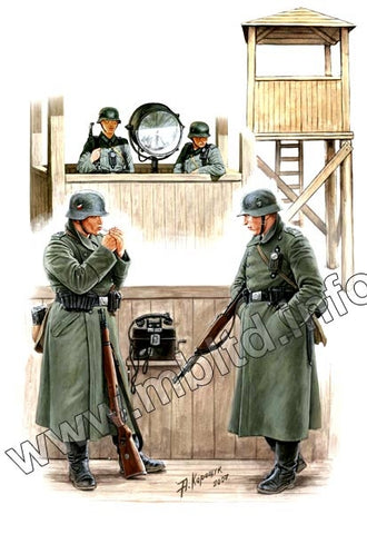 Deutsche Wachsoldaten mit Wachturm