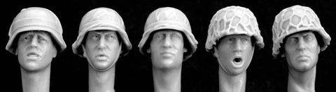 5 heads wearing german helmet with improvised coverings
