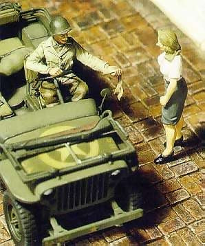 US jeep driver gives a young lady some nylons 1944